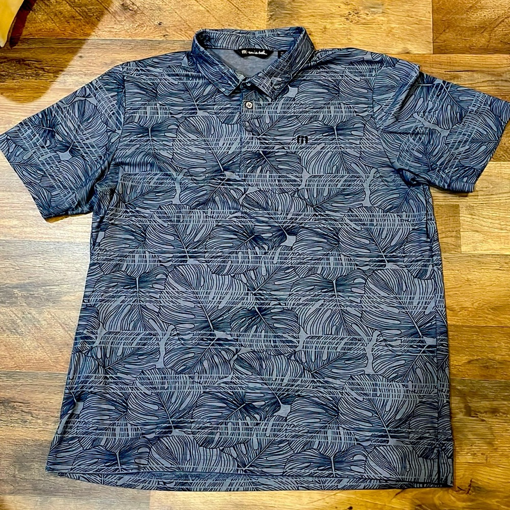 NWOT Travis Mathew Polo beach theme.